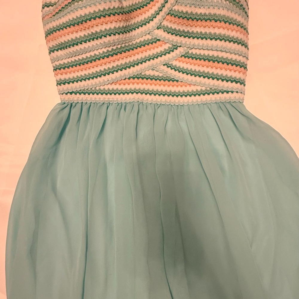 B. Smart Strapless Dress with Pastel Stripes